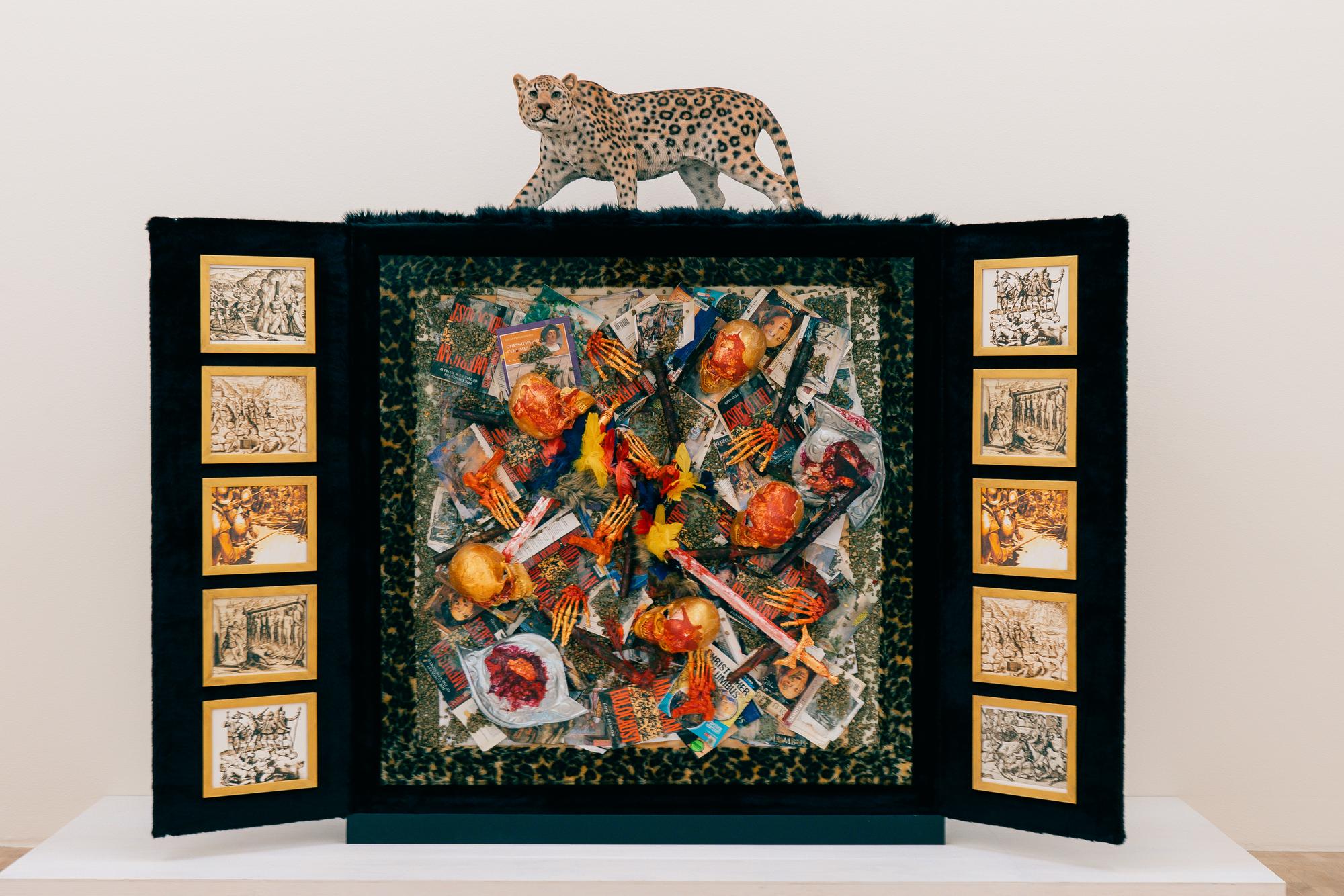 Textile art framed on wall in studio